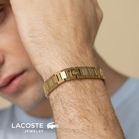 Lacoste bracelet with toggle clasp, METROPOLE collection. Decorated with a petit piqué pattern - Available for him and her. 