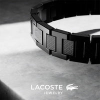 Lacoste bracelet with toggle clasp, METROPOLE collection. Decorated with a petit piqué pattern - Available for him and her. 