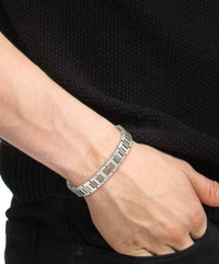 Lacoste bracelet with toggle clasp, METROPOLE collection. Decorated with a petit piqué pattern - Available for him and her. 