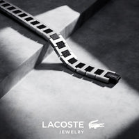 Lacoste bracelet with toggle clasp, METROPOLE collection. Decorated with a petit piqué pattern - Available for him and her. 