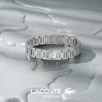 Lacoste bracelet with toggle clasp, METROPOLE collection. Decorated with a petit piqué pattern - Available for him and her. 